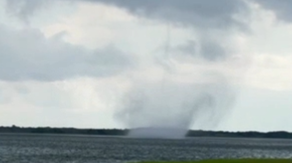 Watch: Waterspout roars onto New Jersey shore beach