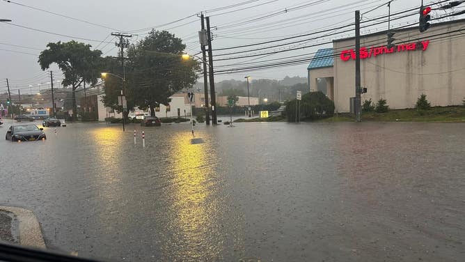 Street flooding in White Plains, NY during thunderstorms.