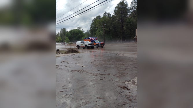 Emergency vehicles respond to flooding in Ruidoso, New Mexico on July 8, 2025.