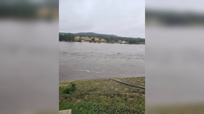 The Guadalupe River began receding quickly after it rose outside Billy Gene's Restaurant.