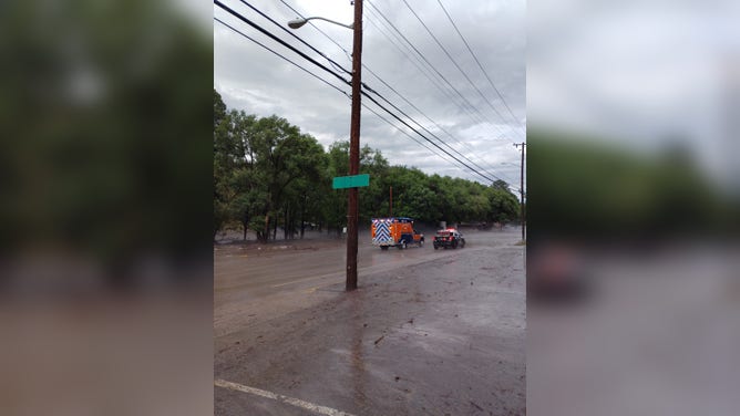 Emergency vehicles respond to flooding in Ruidoso, New Mexico on July 8, 2025.