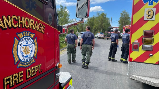 First responders after rescuing a woman who was mauled by a bear.