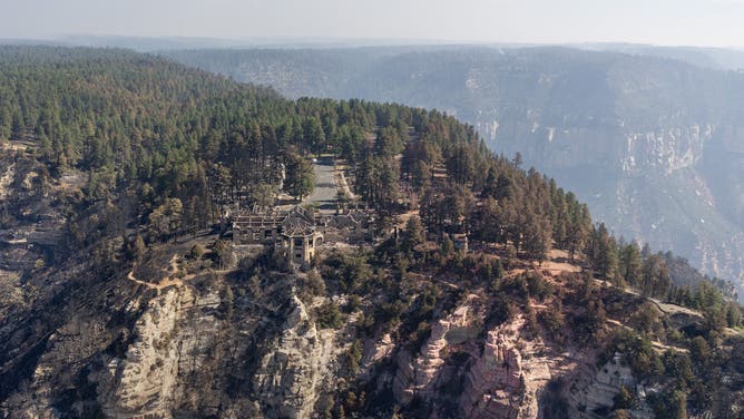 Looking north above the remains of Grand Canyon Lodge and the southern terminus of Arizona State Route 67 in the North Rim developed area. The Transept Trail is visible below to the left of the lodge; the start of Bright Angel Point Trail - on the right. The fire passed through this location July 12-13, 2025.