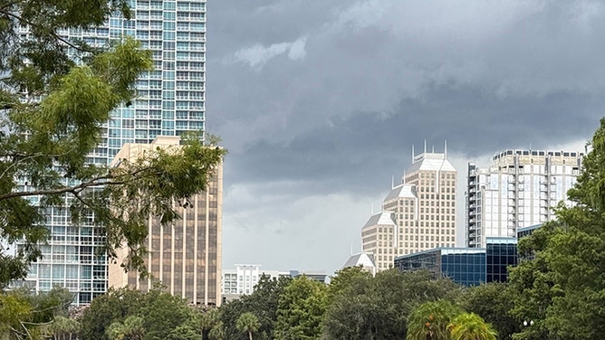 Torrential rain and relentless downpours from Invest 93L are already soaking parts of Florida, as dark storm clouds enveloped Orlando this Tuesday morning.