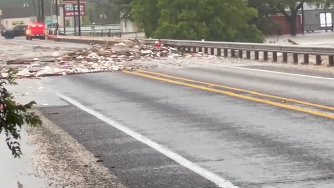 The Guadalupe River crosses over a bridge during deadly flooding on Fourth of July.