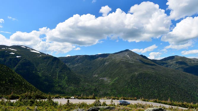Cars traverses the auto road that leads to the top of Mount Washington, standing at an elevation of 6,288.2 ft in the Presidential Range of the White Mountains in New Hampshire on June 12, 2020.