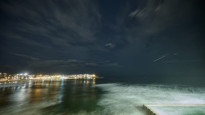 The night sky is illuminated by a meteor shower on July 28, 2022 in Sydney, Australia.