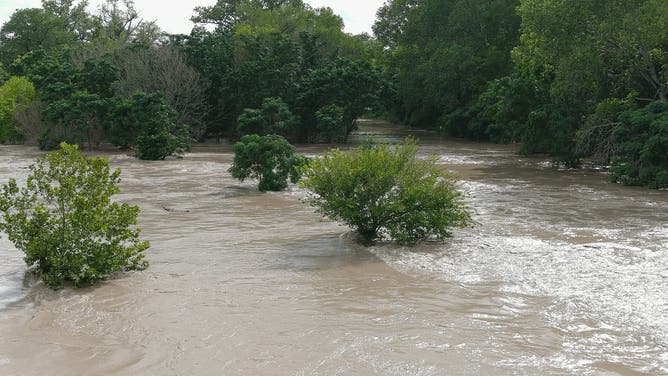 This was taken near Comfort and shows the Guadalupe River several feet over normal. While this flood water doesn't do much in this area, upstream in Hunt and Ingram it flooded streets and people needed to be rescued from vehicles and houses.