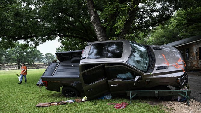 A damaged vehicle at Camp Mystic, the site of where at least 20 girls went missing after flash flooding in Hunt, Texas, on July 5, 2025.