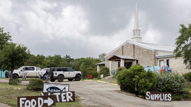 HUNT, TEXAS - JULY 6: Hunt Baptist Church offers free water, food, and clothes to anyone in need on July 6, 2025 in Hunt, Texas. Heavy rainfall caused flooding along the Guadalupe River in central Texas with multiple fatalities reported. (Photo by Jim Vondruska/Getty Images)