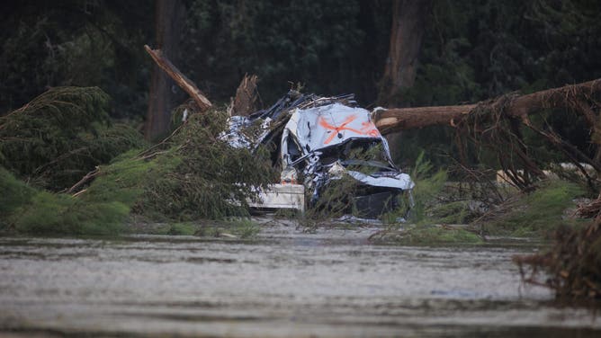 KERRVILLE, TEXAS - JULY 6: A vehicle is seen amongst debris along the banks of the Guadalupe River after deadly flooding in Kerrville, Texas on July 6, 2025. (Photo by Jorge Salgado/Anadolu via Getty Images)