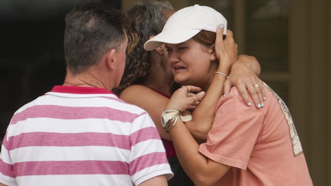 INGRAM, TEXAS JULY 5: Campers and staff from Camp Waldemar, near the North fork of the Guadalupe River, are reunited with their families after heavy rainfall in Central Texas, Saturday, July 5, 2025. (Jason Fochtman/Houston Chronicle via Getty Images)