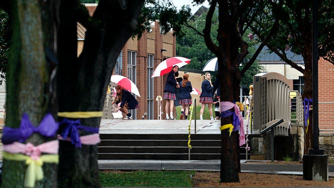 Students make their way to the funeral services for Blair and Brooke Harber at St. Rita Catholic Church on July 14, 2025 in Dallas, Texas. The sisters were killed in the catastrophic floods that swept through central Texas on July 4th.