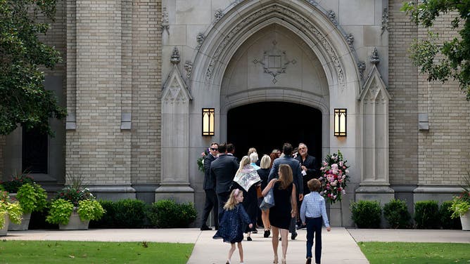 Mourners attend a memorial service for Camp Mystic camper Janie Hunt at Highland Park Presbyterian Church on July 15, 2025 in Dallas, Texas.