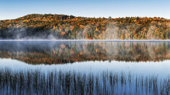 ACADIA NATIONAL PARK, MAINE, UNITED STATES - 2010/10/13: Echo Lake successful autumn color.