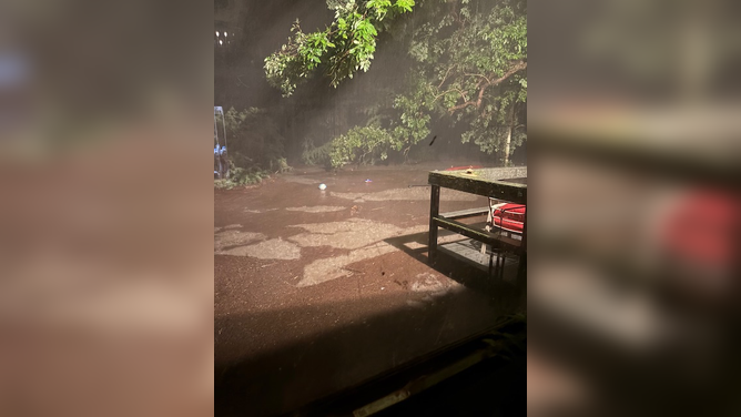 Floodwaters rising outside the Matteson home.