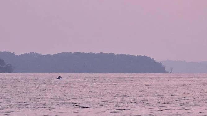 Hazy sunrise at Lake Minnetonka in Excelsior, Minnesota on July 31 as Canadian wildfire smoke creates unhealthy air quality in the upper Midwest.