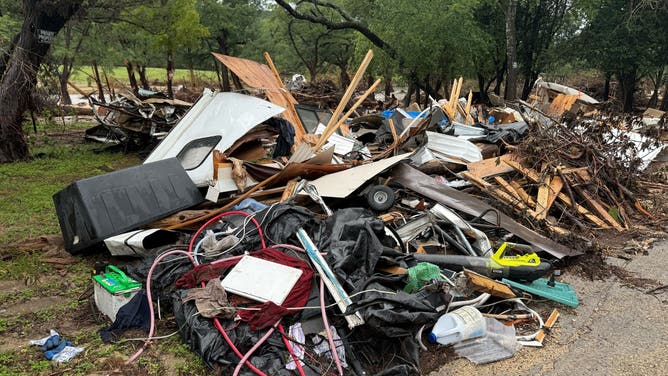 Debris from RVs and campers washed away in Kerrville, Texas during the deadly July 4, 2025 flooding.
