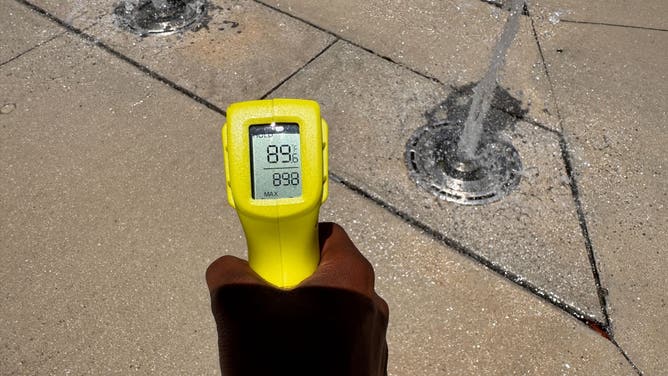The wet ground at a splash pad in West Palm Beach was still 89 degrees during a heat wave on July 29, 2025.