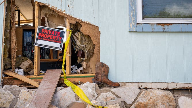 Flood-damaged property is seen on the banks of the Guadalupe River on July 09, 2025 in Kerrville, Texas.