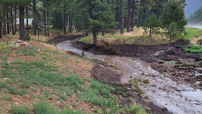 This image shows the aftermath of flooding in Ruidoso, New Mexico, on Tuesday, July 8, 2025.