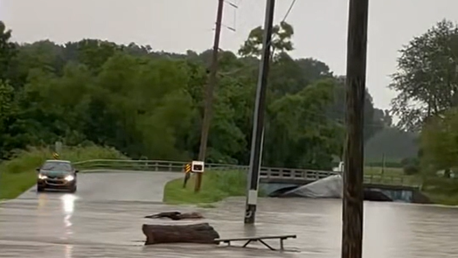 The camper crashed into the bridge.