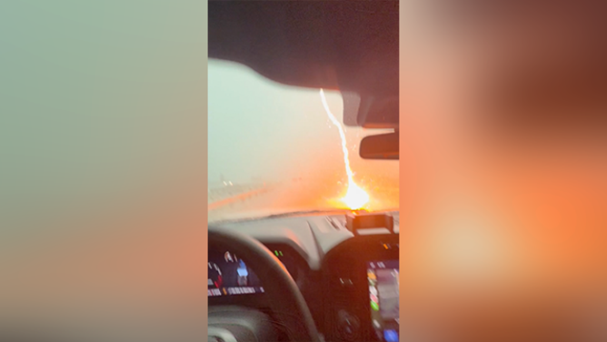 This image comes from a dramatic video that recorded the moment when a bolt of lightning hit a truck in Texas on Friday, July 25, 2025.