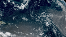 Invest 96L meanders in Atlantic but trailing tropical waves raise concern