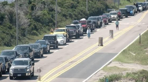 Long lines stretch at North Carolina ferry terminals as Hurricane Erin prompts evacuation orders