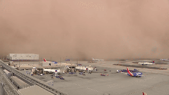 Towering haboob turns day into night in Phoenix as powerful winds knock out power, cause travel chaos - Fox News