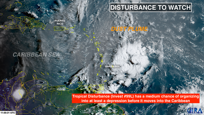 This satellite image shows Invest 99L approaching the Caribbean Sea on Aug. 24, 2025.