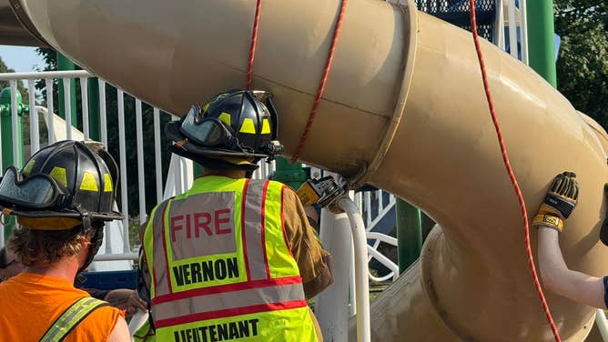 First responder removing a section of the slide.