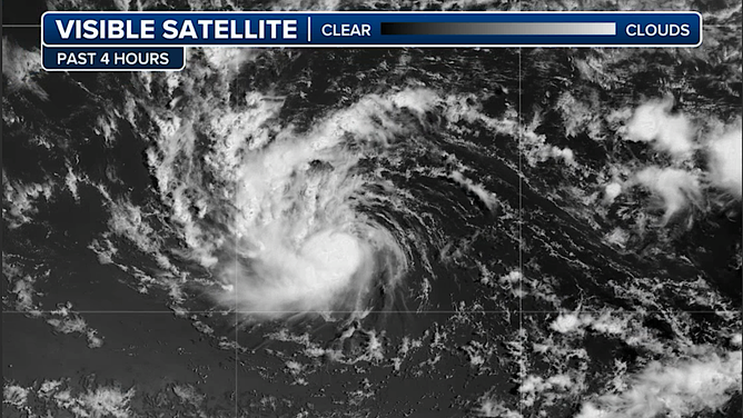 This graphic shows satellite imagery of Tropical Storm Erin.