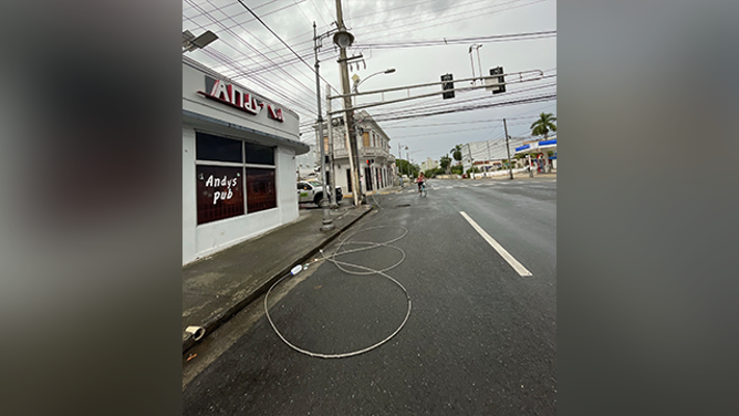 This photo shows power lines that were brought down as a result of Hurricane Erin's winds in Puerto Rico on Aug. 17, 2025.