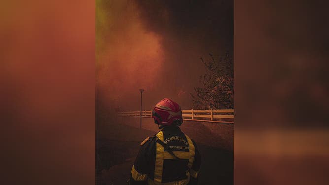 Firefighting teams battle a large wildfire in the Corbieres Massif in southern France's Aude department on August 06, 2025.