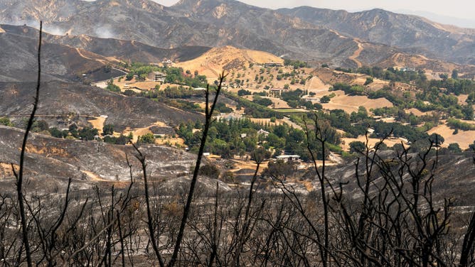 Charred hillsides during the Canyon Fire in Hasley Canyon, California, US, on Friday, Aug. 8, 2025. Four fires in the Los Angeles area have consumed more than 110,000 acres and sent thousands of residents fleeing for their lives as dry conditions and strong winds fan flames.