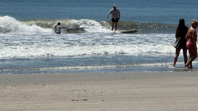 Beach life mostly returned to normal on Isle of Palms, South Carolina on Thursday, Aug. 21, 2025 after Hurricane Erin passed the Carolina coast.