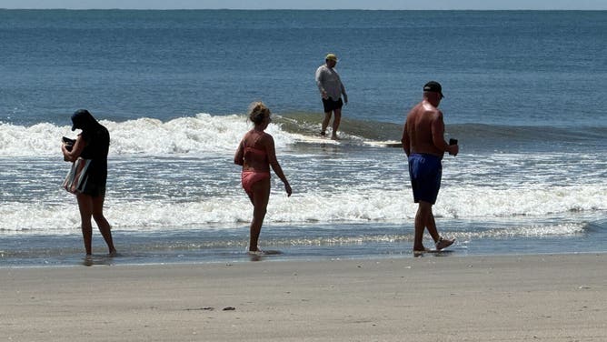 Beach life mostly returned to normal on Isle of Palms, South Carolina on Thursday, Aug. 21, 2025 after Hurricane Erin passed the Carolina coast.