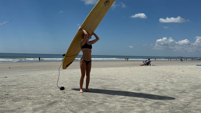 Beach life mostly returned to normal on Isle of Palms, South Carolina on Thursday, Aug. 21, 2025 after Hurricane Erin passed the Carolina coast.