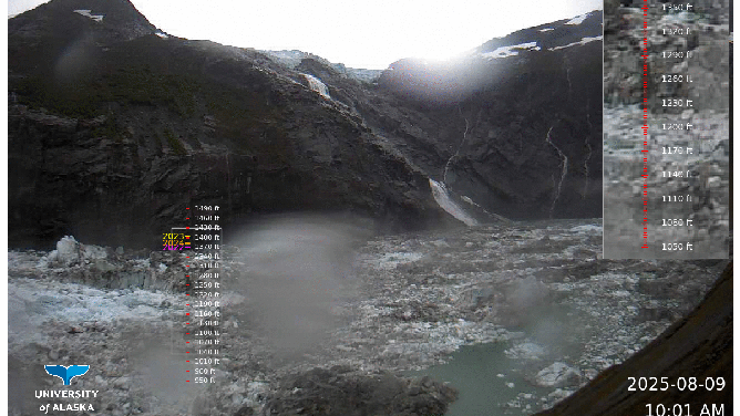 This animated image shows water levels dropping within Suicide Basin in Alaska after a glacial lake outburst between Aug. 9 through Aug. 12.