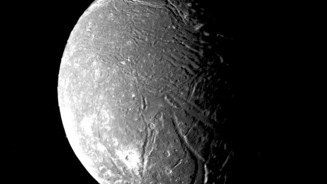 Photo of the moon Ariel around Uranus.