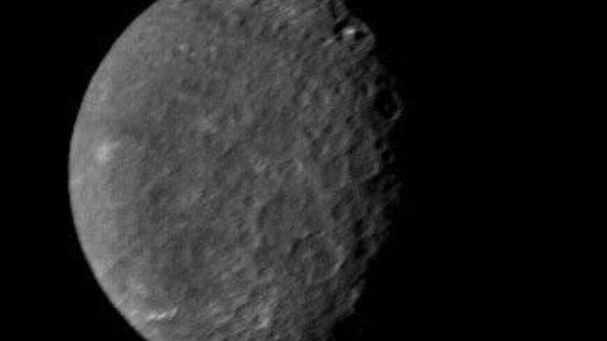 Photo of the moon Umbriel around Uranus.