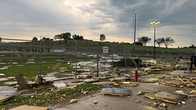 This image provided by the Nebraska Department of Correctional Services shows extensive damage to the Nebraska State Penitentiary after straight-line winds tore the roof off the facility.