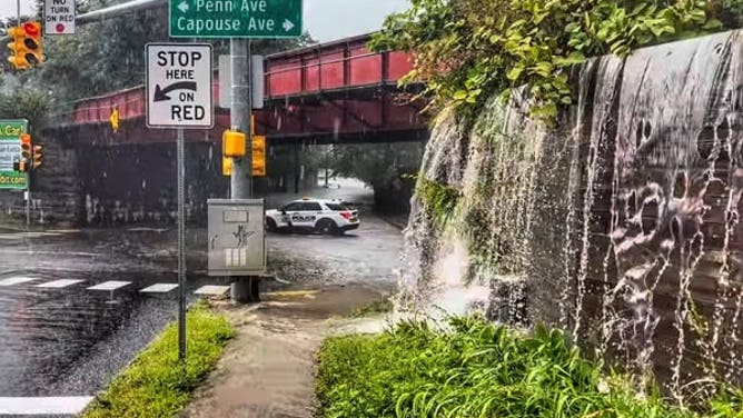 Scranton police block flooded intersections during severe thunderstorms Wednesday, August 14, 2025.