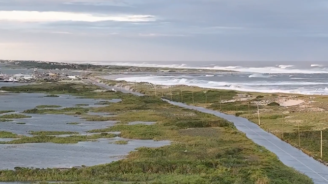 Large waves clang  from Hurricane Erin clang  onto beaches connected  Long Island.