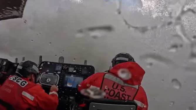 A massive wave produced by Hurricane Erin hits a U.S. Coast Guard boat off North Carolina on Friday, Aug. 22.