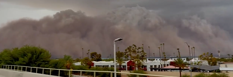 Towering haboob turns day into night in Phoenix as powerful winds knock out power, cause travel chaos