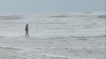 Slow-moving system to bring tropical downpours, rough surf and strong winds to the Gulf Coast