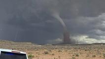Photos: Rare Utah tornado spotted swirling through desert terrain