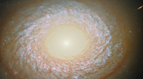This feathery galaxy refuses to be defined even in new Hubble telescope images